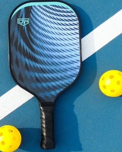 Pickleball paddle and balls